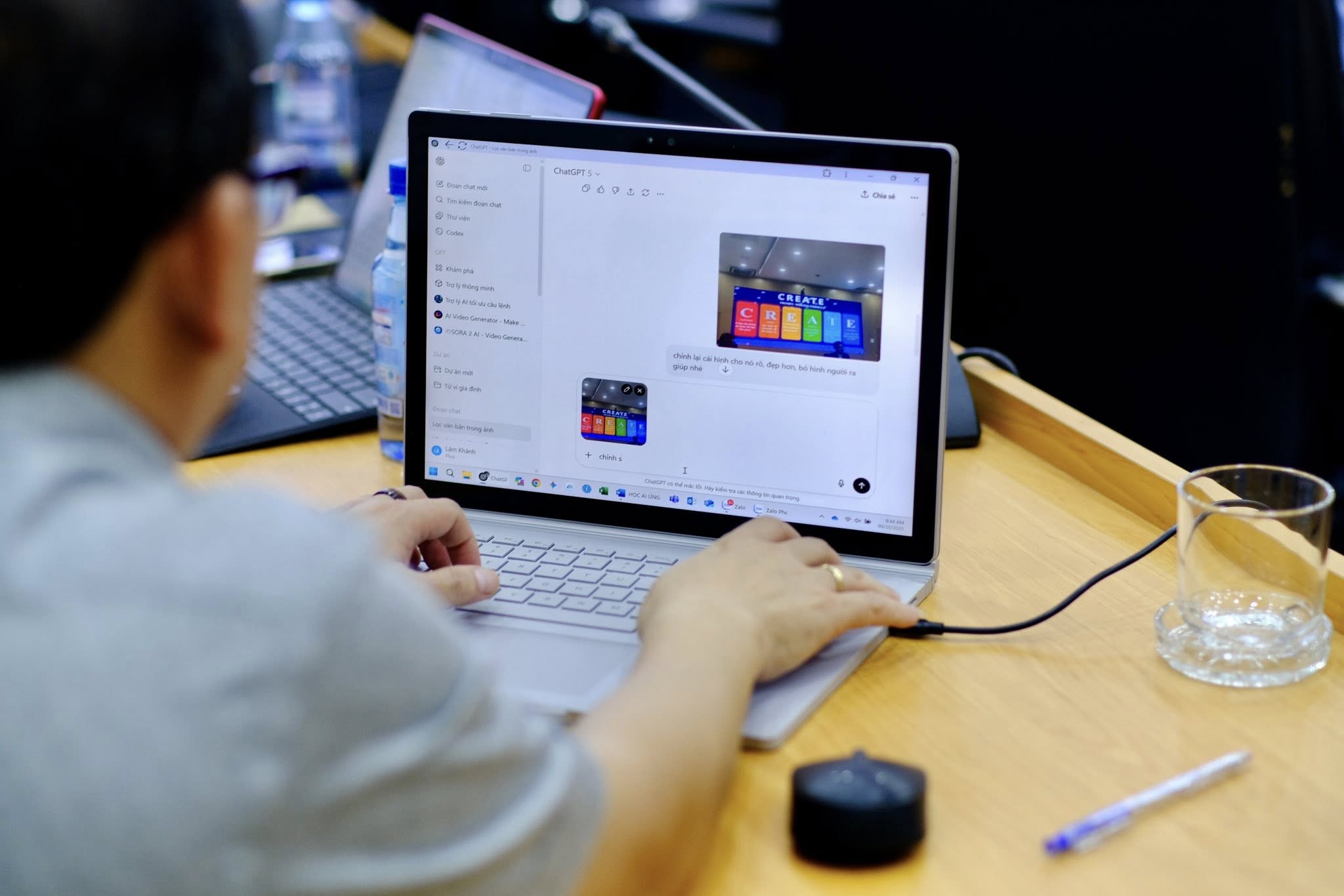 Person working on laptop at desk